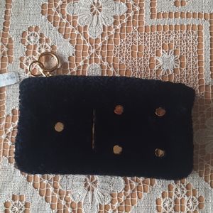 Chaos
Domino Shearling Mini Purse Charm